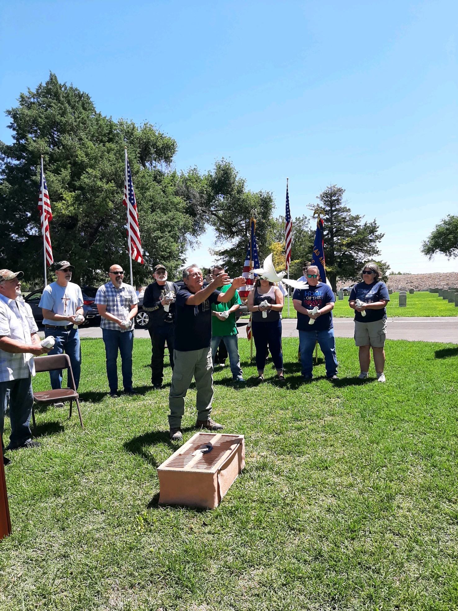 Second picture is Flavio Gallegos leading the ten volunteers in releasing the doves after the ceremony.  What a beautiful conclusion! 